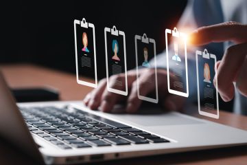 person using electronic devices for store customer data